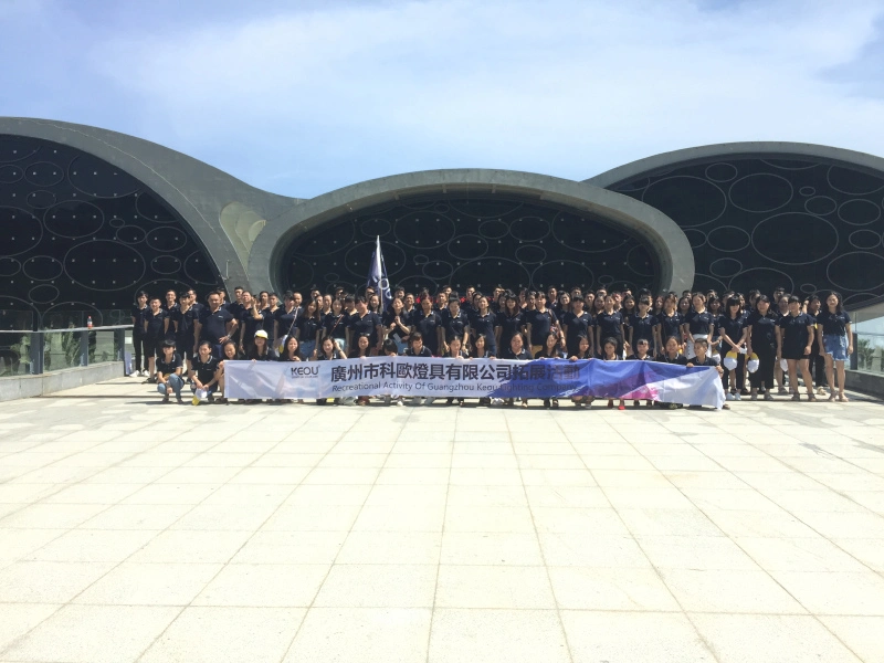 Production Team - Full KEOU factory staff group photo taken at outdoor team building event